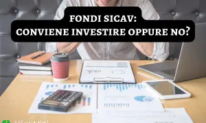 Uomo analizza grafici e dati finanziari. Cosa sono i fondi SICAV e se conviene investire.