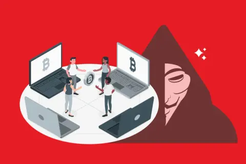 Persone discutono di criptovalute, con un laptop che mostra il simbolo di Bitcoin. Un'ombra minacciosa incombe, suggerendo i criptovalute rischi.