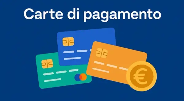 Carte di pagamento: scopri la differenza tra carta di credito e debito. Tre carte colorate e una moneta euro.
