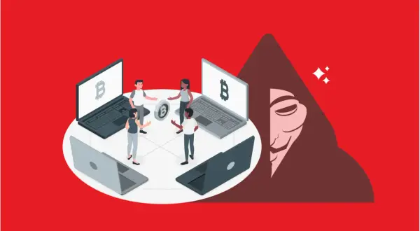 Persone discutono di criptovalute, con un laptop che mostra il simbolo di Bitcoin. Un'ombra minacciosa incombe, suggerendo i criptovalute rischi.