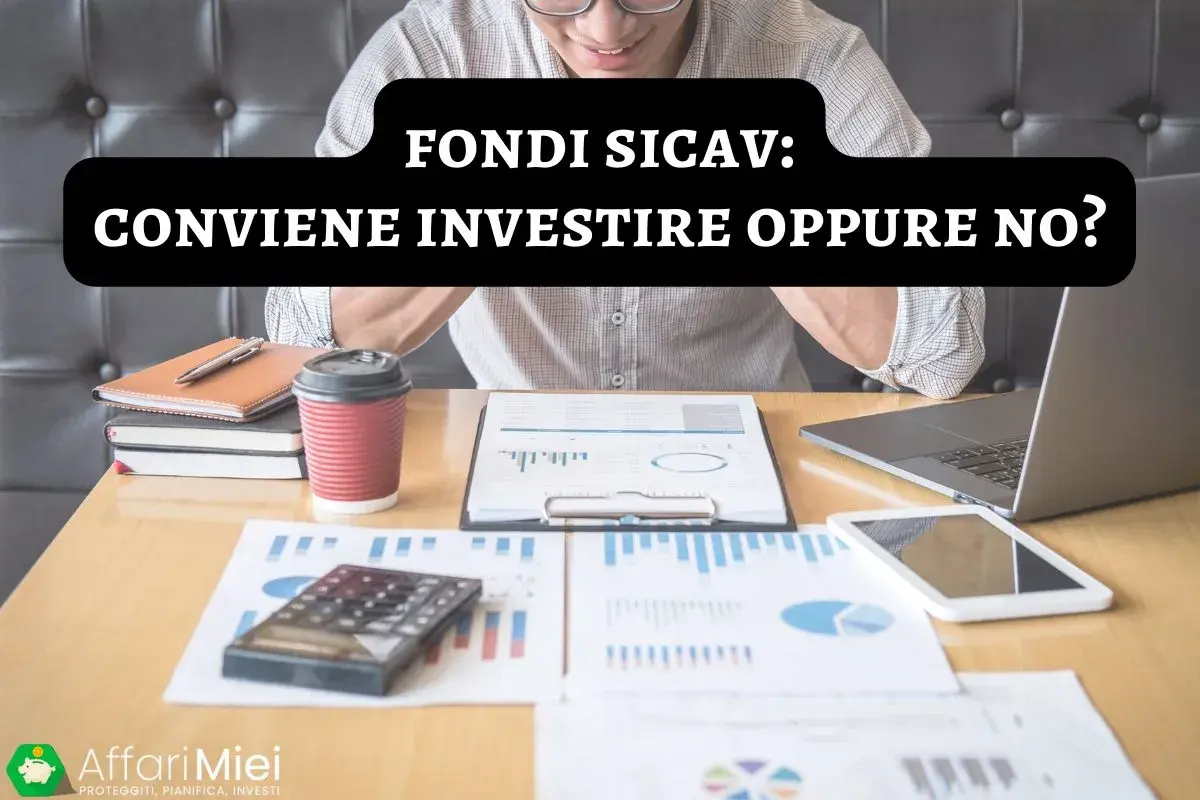 Uomo analizza grafici e dati finanziari. Cosa sono i fondi SICAV e se conviene investire.